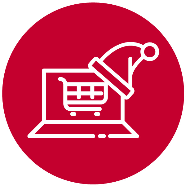 Image of a laptop with a Santa hat and a shopping trolley on the screen