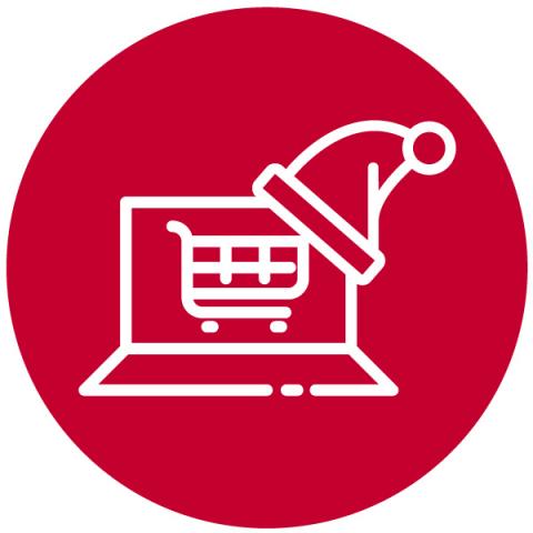 Image of a laptop with a Santa hat and a shopping trolley on the screen