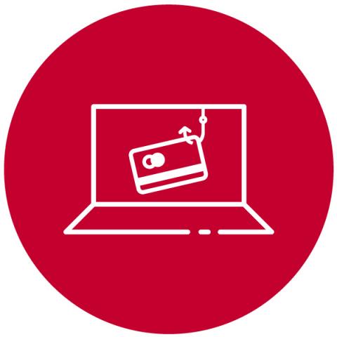 A laptop, with a fishhook and a bank card on the screen