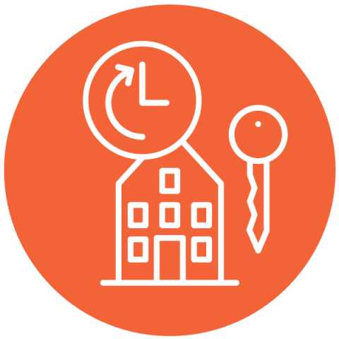A block of flats with a key and a clock