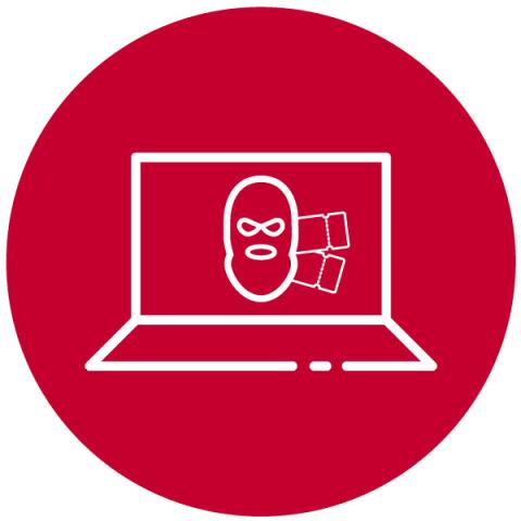 Picture of a cybercriminal's face on a laptop screen