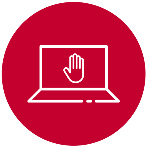 Laptop and a hand shaped like a stop sign on the screen