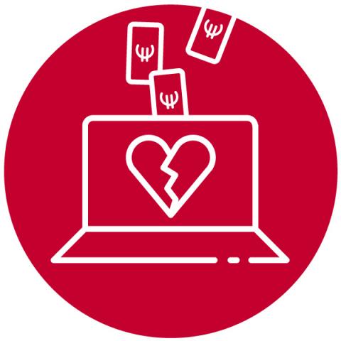 Laptop, broken heart on the screen, and euro bills disappearing
