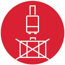 Equipaje de mano tachado y maleta de ruedas